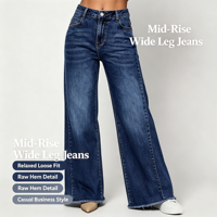 Jean évasé à jambe large pour femme, taille mi-haute, en denim à ourlet brut, idéal pour une tenue de soirée