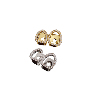 Grillz Doble Chapado en Oro con Incrustaciones de Circonitas, Unisex, para Dientes Superiores, Forma de Gota de Agua, Joyería Hip Hop - Product Image 1