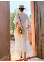 Printemps et été Robe de plage à broderie française pour femmes avec manches bulle Robe blanche
