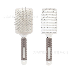 Brosse à cheveux massante pour le cuir chevelu, volumisante, avec coussin d'air, en nylon et plastique, de forme oblongue, pour la population générale - Product Image 1