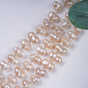 ไข่มุกธรรมชาติรูปทรงบาโรกสีชมพูขนาด7นิ้ว8-11มม. พร้อมไข่มุกน้ำจืดด้านข้าง - Product Image 3