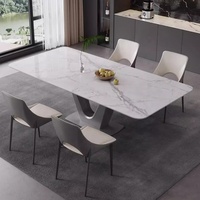 Table à manger carrée moderne haut de gamme en pierre frittée minimaliste, pliable et extensible, avec des caractéristiques en acier inoxydable super cristallin