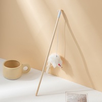 Vente en gros : Baguette interactive pour chat et chaton avec manche en bois et fourrure de lapin, pour soulager l'ennui