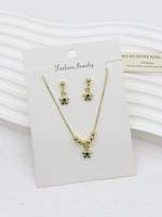 Ensemble de bijoux plaqué or 18 carats en cuivre avec pendentif dentaire et boucles d'oreilles, vente en gros