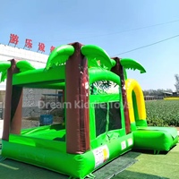 Château gonflable de luxe avec toboggan, thème Jungle Tropicale Palmiers, pour événements et fêtes