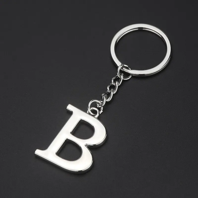 Özel fabrika gümüş başlangıç adı 26 alfabe anahtarlık Paris londra alfabe A B C mektup 3D araba mektup boncuk anahtarlıklar