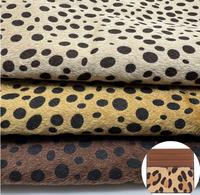 Tissu en fausse fourrure de mouton à motif léopard utilisé pour le portefeuille