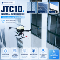 Drone de nettoyage de centrales électriques robuste et résistant aux intempéries, à longue autonomie, avec adhérence magnétique pour le lavage des vitres extérieures des gratte-ciel