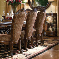 Chaise de salle à manger de style américain, en bois sculpté, luxueuse, avec revêtement en cuir véritable antique.