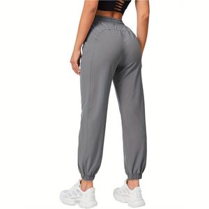 Pantalons de sport décontractés pour femmes grande taille OEM, taille élastique, amples, respirants, à séchage rapide, amincissants, pour la course à pied - Product Image 3
