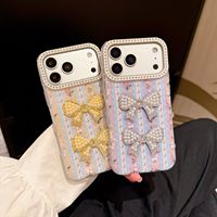 Coque de téléphone rigide magnétique en TPU mat effet premium avec strass en forme de cœur et nœud, ornée de perles de style nouveau pour iPhone 18