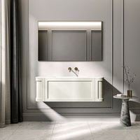 Meuble-lavabo de salle de bain en MDF courbé de style français avec miroir rétroéclairé par LED, quincaillerie en cuivre doré, lavabo en céramique intégré, salle de bain de luxe