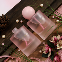 Flacon de parfum miniature cylindrique de haute qualité, nouveau design, avec bouchon rose