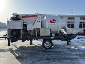 Máquina mezcladora de tambor de cemento de hormigón montado en remolque hidráulico eléctrico diésel de fábrica para construcción de viviendas - Product Image 3