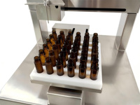 Machine de remplissage de liquides pour ampoules, flacons, bouteilles en verre et en plastique pour huiles parfumées