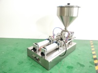 Machine de remplissage semi-automatique à double tête avec trémie (Machine de remplissage de beurre à piston, Remplisseuse de crème pneumatique) (100-1000ml)