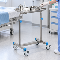 Chariot à double bras en acier inoxydable pour salle d'opération avec roues pour le placement et l'organisation mobile des instruments chirurgicaux
