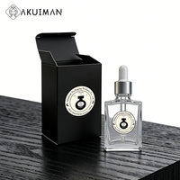 Flacon de sérum carré en verre de luxe à succès avec compte-gouttes pour l'emballage de liquides cosmétiques et d'huiles pour salons de beauté