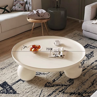 Table basse de luxe ronde avec plateau, pieds sphériques, blanc crème mat, personnalisable pour salon moderne