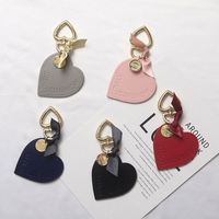 Porte-clés en cuir en forme de cœur pour femme, porte-clés en cuir en forme de cœur tendance, porte-clés de voiture, porte-clés de maison, breloque pour sac, pendentif de voiture, cadeau