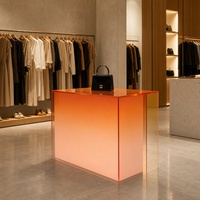 Présentoir en acrylique éclairé par LED, comptoir de bar épais en acrylique sur mesure pour boutique de vêtements et showroom de mode