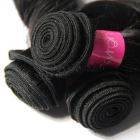Aliexpress chaude usine à prix réduits new premium vierge cuticules alignés brut brésilien cheveux bundle avec oeuf rouleau curl
