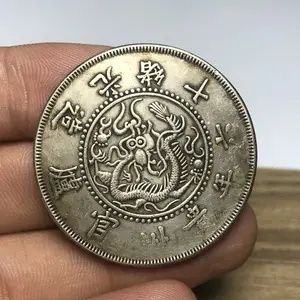Prata pura dólar preta e amarela pasta Daqing moedas de prata Guangxu 14 anos Guizhou forno oficial feito Qianbao