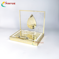 Support d'affichage de parfum en acrylique ultra moderne en miroir métallique doré de luxe pour comptoir cosmétique