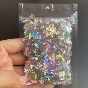 Vente en gros <span class=keywords><strong>de</strong></span> paillettes personnalisées en forme <span class=keywords><strong>de</strong></span> poisson <span class=keywords><strong>de</strong></span> mer holographique PET pour la décoration artisanale <span class=keywords><strong>de</strong></span> Noël - Product Image 5