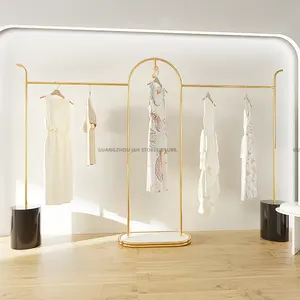 कपड़े की दुकान के लिए खजांची काउंटर फैशन कपड़े प्रदर्शन प्रदर्शनी स्टैंड बच्चे परिधान रैक प्रदर्शन लक्जरी अलमारियों