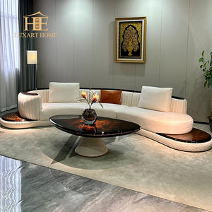 इटैलियन लाइट लग्जरी कर्व्ड मॉड्यूलर सोफा हाई ग्लॉस पेंट अखरोट लेदर सोफा मूवी स्टूडियो सोफा - Product Image 1