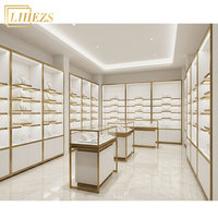 Muebles Modernos para Joyería de MDF Dorado con Vidrio Templado, Exhibidores de Pared para Joyería