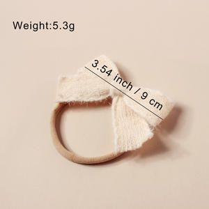 Nuova fascia per capelli natalizia per bambini con fiocco in peluche lavorato a maglia su elastico in Nylon - Product Image 4