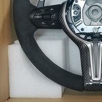 Volant en suède et fibre de carbone en stock pour BMW X3 X5 M3 M5 F22 F30 F32 F35 F36 F20 F35 M6 F10 F25 F11 F12 F15 F16 E90
