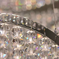Long lustre moderne haut de gamme personnalisé de conception américaine hall d'hôtel grand lustre d'escalier d'anneaux de cercle de cristal