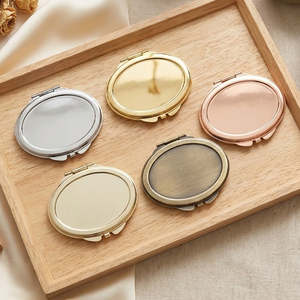Oval <b>Compact</b> <b>Mirror</b> Setting Blank Silver Electroplated HD Double Sided Folding Pocket Metal Frame Custom Logo Makeup <b>Mirror</b> - Product Image 1