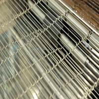 Machine à tempérer et enrober le chocolat automatique en acier inoxydable avec bande plate flexible pour la fabrication de chocolat