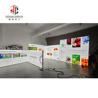 Stand d'exposition modulaire personnalisé avec éclairage LED et graphiques en tissu SEG, boîte lumineuse pour salon professionnel, idéal pour la promotion de marques de vêtements
