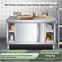 Plan de travail de cuisine en acier inoxydable avec porte coulissante, planche à découper, armoire de rangement, table de découpe pour restaurant
