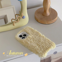 Coque de téléphone en peluche couleur unie style INS avec support de téléphone, compatible avec les modèles 11/12/13/16/17 Pro Max, design maquillage pour femme