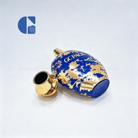 Flacon de parfum ovale de luxe oriental bleu foncé avec feuille d'or, contenant en verre pour parfum de niche de luxe, bouchon doré, logo personnalisé