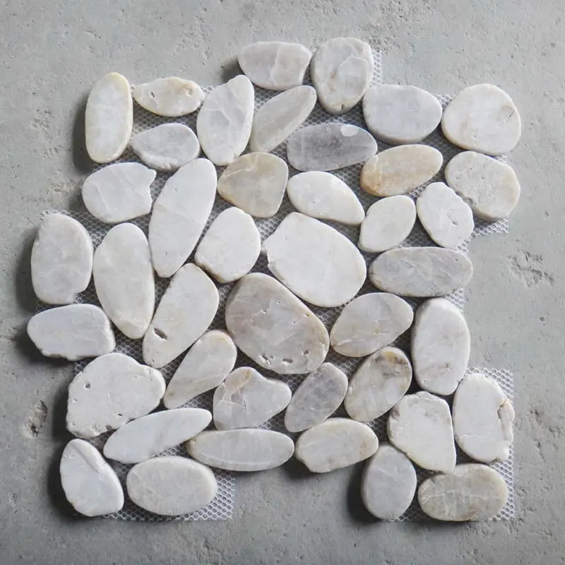 White flat resin river mesh paving cobble and pebble stone on net