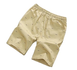 Vêtements pour hommes Short de sport à taille élastique et à cordon Collections d'été Short décontracté imprimé à pois et de couleur unie Prix de gros - Product Image 1
