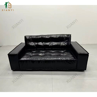 Canapé trois places multifonctionnel en cuir moderne et simple avec garnissage en duvet, cuir ciré noir, design en ligne