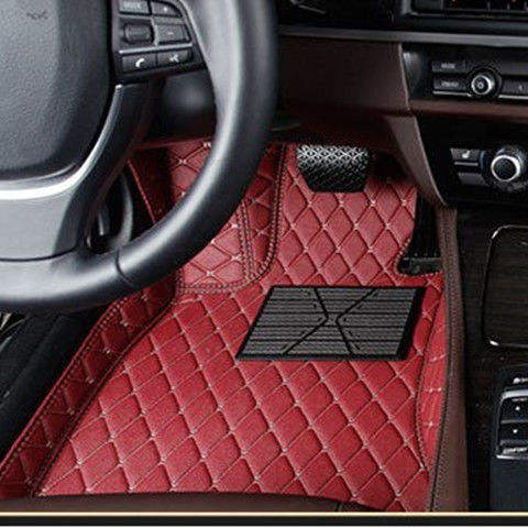 The driver is wearing burgundy