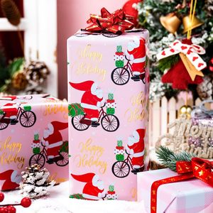 Papel de regalo navideño rosa con diseño divertido de Papá Noel en bicicleta, patrón reversible a cuadros, 17 pulgadas x 32.8 pies, para manualidades navideñas - Product Image 4