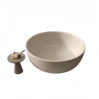 Baignoire ovale moderne de luxe en pierre artificielle finition mate couleur café au lait, écologique et durable pour une immersion profonde