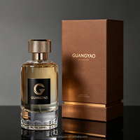 Vente en gros de flacons de parfum de luxe de 100 ml, style tendance, autocollants personnalisés pour flacons de parfum en verre cylindriques avec boîte personnalisée