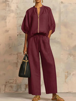 Ensemble pantalon deux pièces tendance été 2026 pour femme, grande taille, streetwear, haut uni à fermeture éclair à manches courtes et pantalon palazzo, vente en gros
