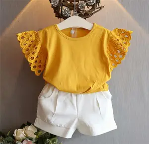 Ensembles de vêtements pour filles évider t-shirt haut et short été enfants portent deux pièces shorts bébé fille vêtements en gros